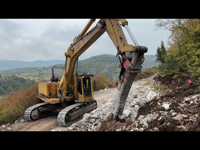 Caterpillar 245B With Hydraulic Hammer Working On Road Project By Zamkos - 4k