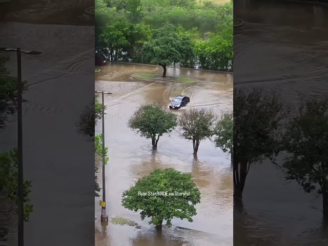 Motorist drives into floodwater in southeast Texas as onlookers scream