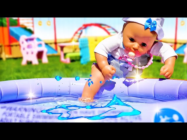 Baby Annabell doll swimming & baby doll plays with toys in the water pool. Swimsuit for baby dolls.