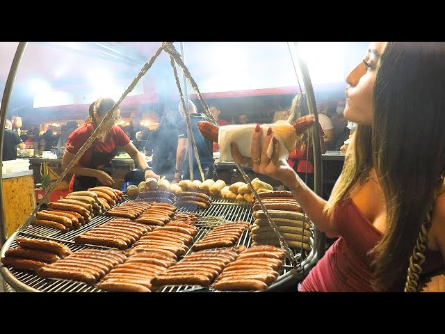 Italy Street Food Fests. Hot Polish Sausages, Bavarian Grilled Meat, Pyramidal Grills of Asado