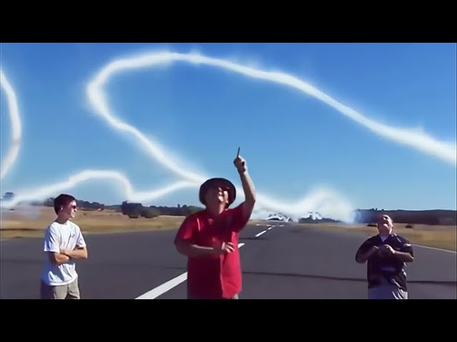 Wingtip Vortices and Smoke Create White Ribbons in the Air