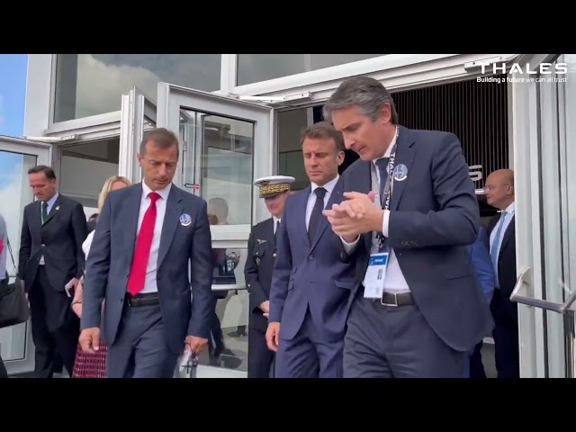 Patrice Caine hosts French President Emmanuel Macron at the Thales stand