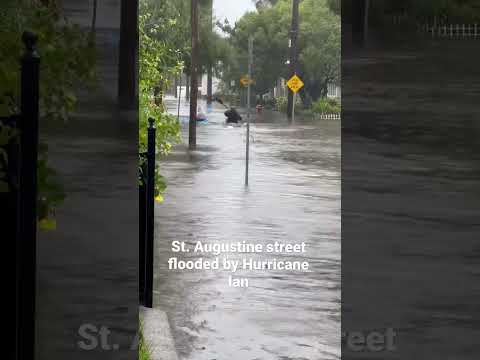 Boaters making due on a street flooded by Hurricane Ian Wednesday in St. Augustine, FL.