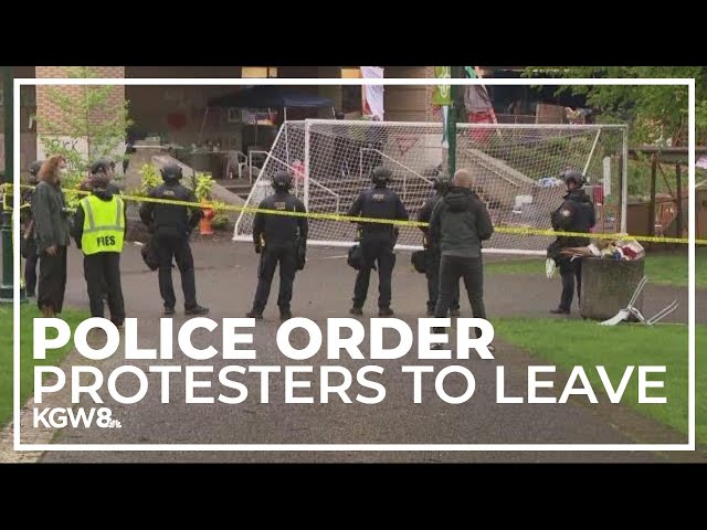 Police officers ask protesters to leave Portland State library or risk being arrested
