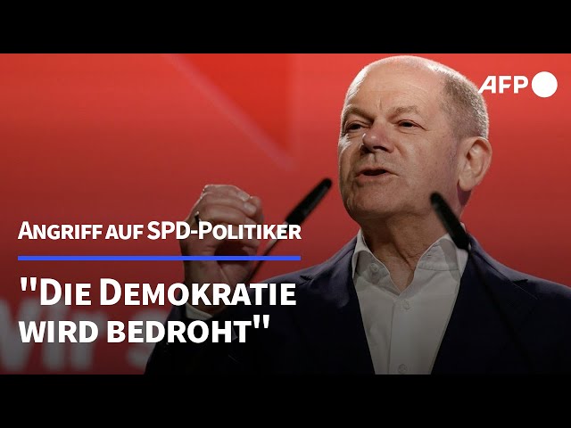Scholz: "Die Demokratie wird bedroht" | AFP