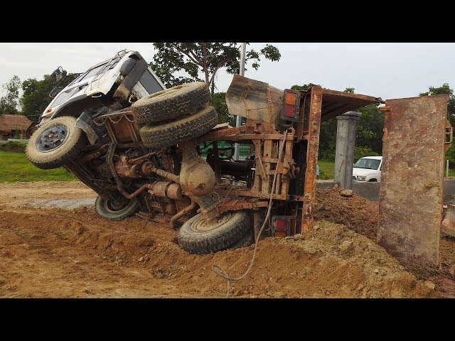 Dump Truck Accident Recovery By Bulldozer