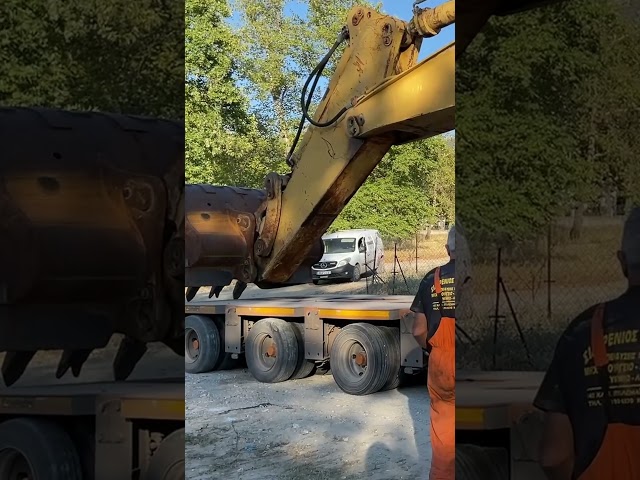 Loading The Caterpillar 245 Excavator - #megamachineschannel
