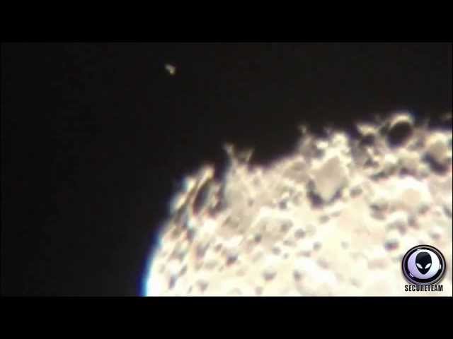 LARGE UFO ABOVE MOON THEN LANDS ON THE SURFACE! 2014 ALIEN COVERUP