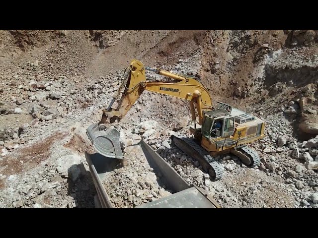 Liebherr 974 Excavator Loading Caterpillar 775B Dumper - Sotiriadis/Labrianidis Quarries