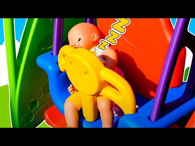 Baby Annabell doll is crying. Baby doll on a playground & a toy slide. Pacifier for baby born doll.