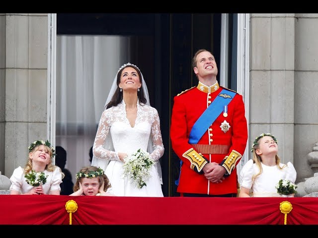 The Duke and Duchess of Cambridge watch the fly past with their families