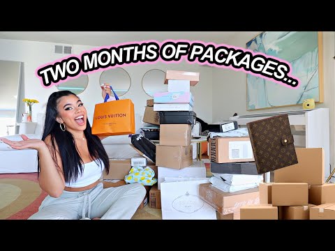 two months of packages! huge holiday clothing, makeup pr unboxing haul | vlogmas