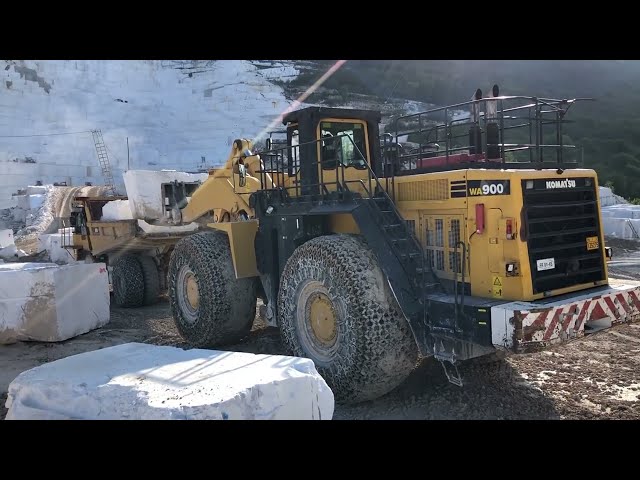 Komatsu WA900 Wheel Loader Loading Marble Blocks On Caterpillar Dumpers - Birros Marble Quarries