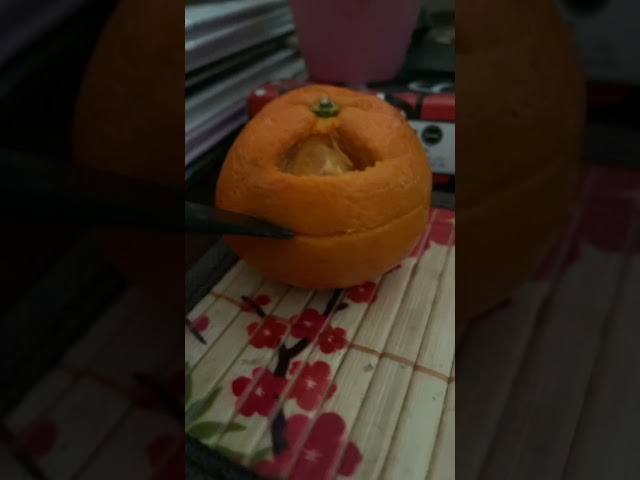 Carving an orange cause I am bored