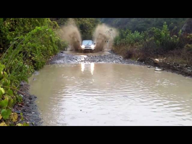 My 4Runner going through a Puddle