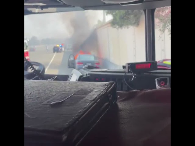 California police officer pulls driver from flaming car