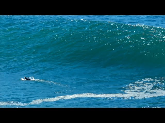Surfing alone at Deadmans Manly