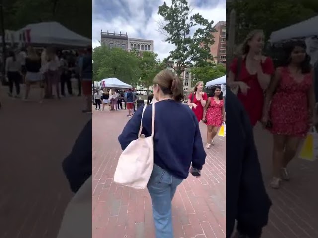 Walking through a crowd in Boston at a vintage clothing pop up event in Copley Square