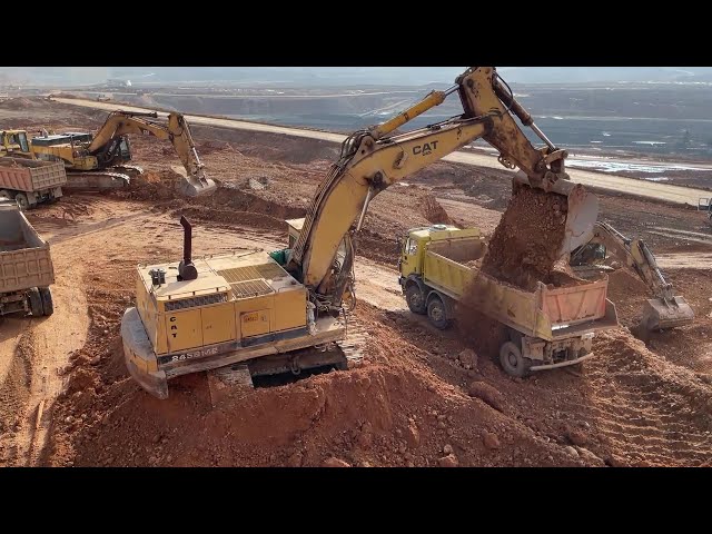 Caterpillar 245 Excavator Loading Mercedes & MAN Trucks