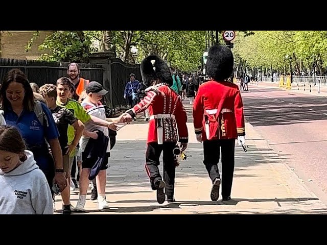 King’s Guard surprises a Stranger with a High-Five!