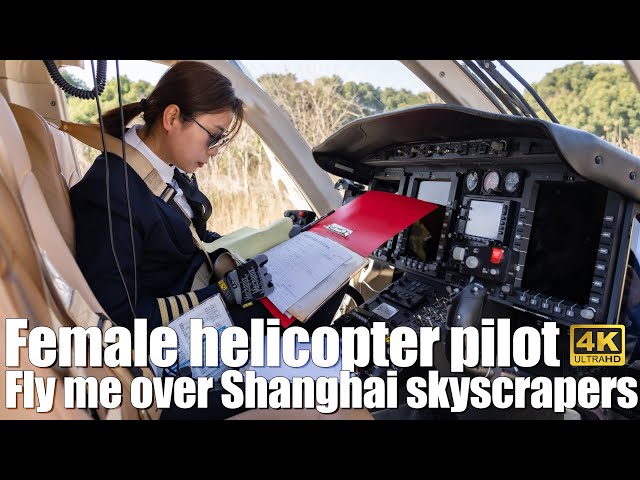 Female helicopter pilot fly me over Shanghai skyscrapers