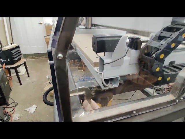 Testing the CNC machine enclosure door with hydraulic springs