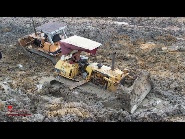 Unexpected​ Big Bulldozer Clearing Mud And Recovery Of Dozer Sink In Mud Helping Old Komatsu D41A