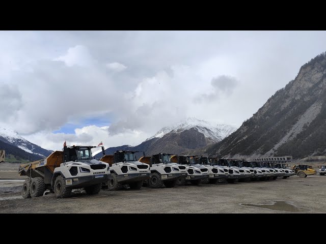 Lago di Resia - Construction Machines / Lots of Dump Trucks / Liebherr / CAT / Volvo