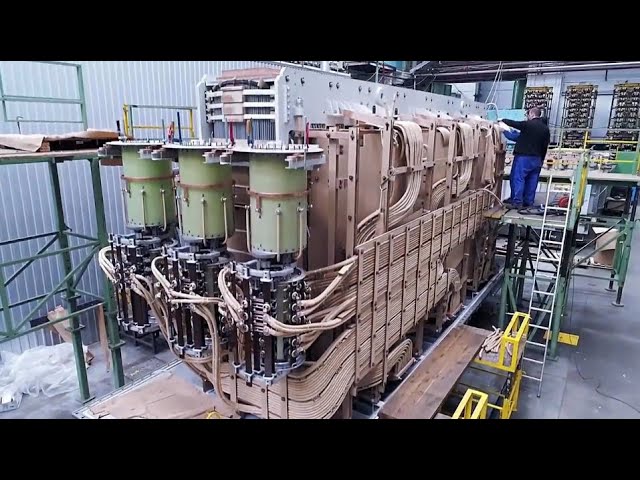 Hypnotic Process Of Manufacturing & Installing Giant Power Transformers. Modern Wire Winding Machine