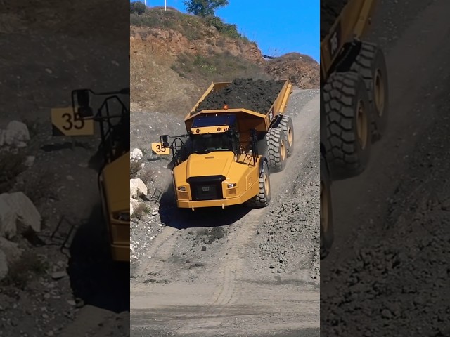 CAT Truck tackles steep slope!