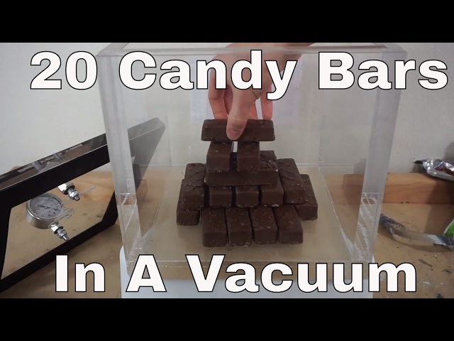What Happens When You Put 20 Candy Bars In a Huge Vacuum Chamber?