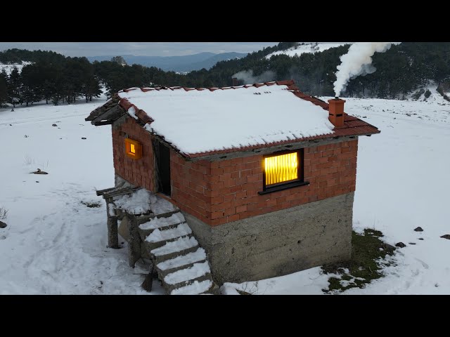 Staying in an abandoned brick house during a snowdrift