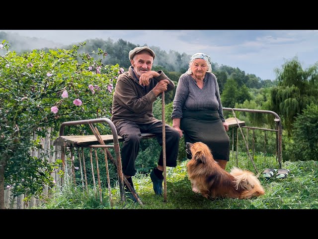Hard life of an elderly couple in a mountain village on the border with Romania