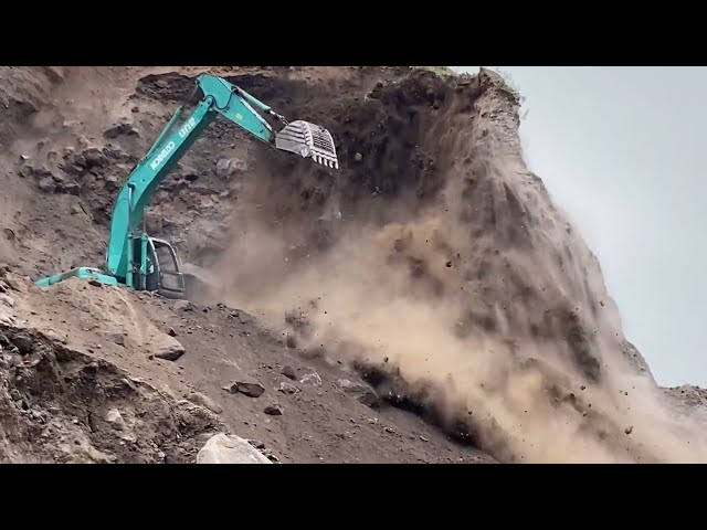 Sand mining,Cutting cliffs with a Kobelco SK 200 excavator in a sand mine