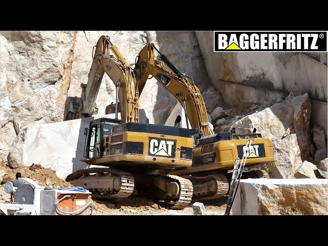 HUGE marble block is pulled by Caterpillar 345C and 336D excavators