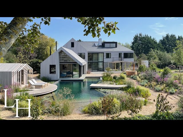 Inside Dan & Nina's Breathtaking Sustainable Home With Natural Swimming Pond