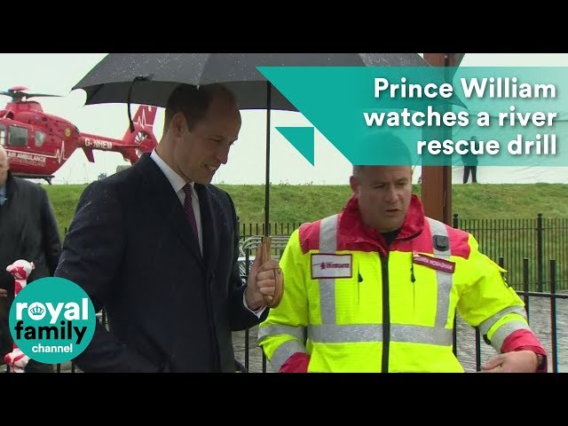 Prince William watches a river rescue drill