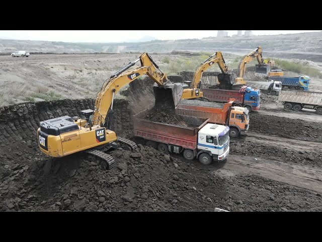 Aerial Movie Of Caterpillar And Liebherr Excavators Working In Huge Mining Sites