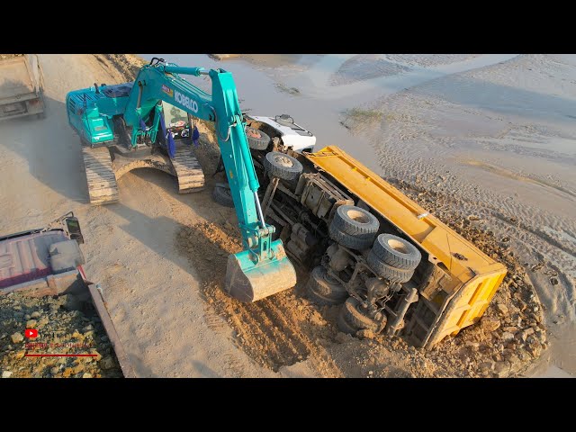 Unexpected​ Dumper Truck Fall Down​ In Mud And Safety Recovery With Excavator Kobelco SK260Lc