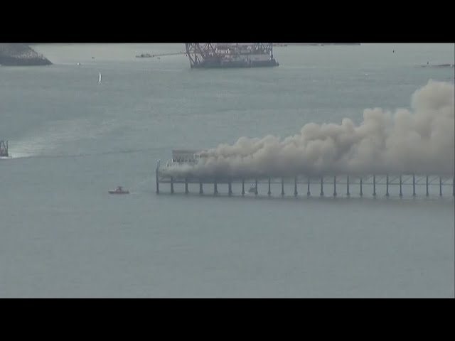 Fire crews contain spread of massive fire that erupted on historic Oceanside Pier