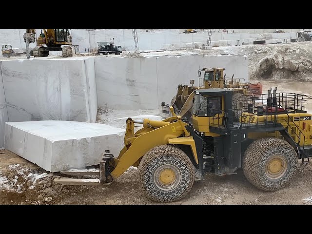 Caterpillar And Komatsu Excavator Pulling Huge Marble Column On Birros Marble Quarries