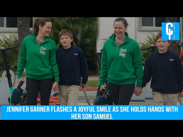 Jennifer Garner flashes a joyful smile as she holds hands with her son Samuel