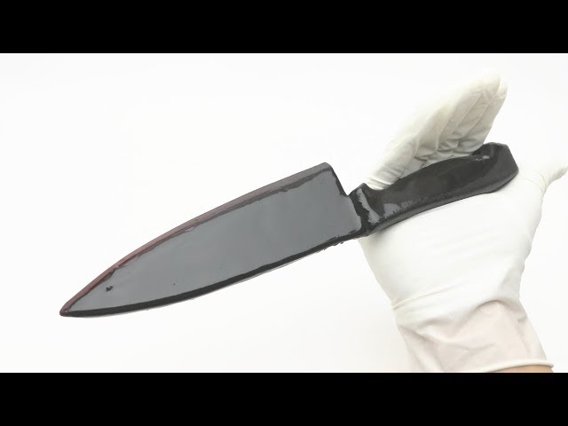 Food can be cut. Kitchen knife made with chocolate