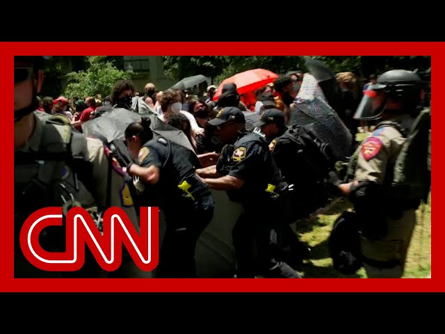Watch moment police tear down protesters' barrier at University of Texas at Austin