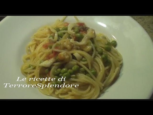 Spaghetti con seppie, piselli e pomodorini