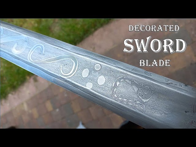 Forging a Viking age sword with decorated blade. Blacksmithing