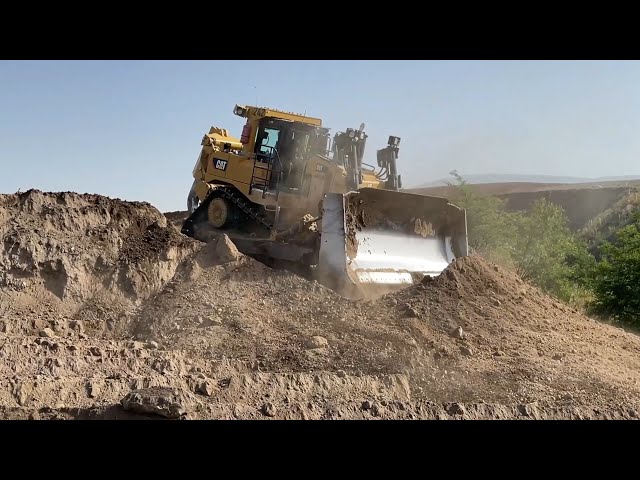 Caterpillar D9T Bulldozer Pushing Soil