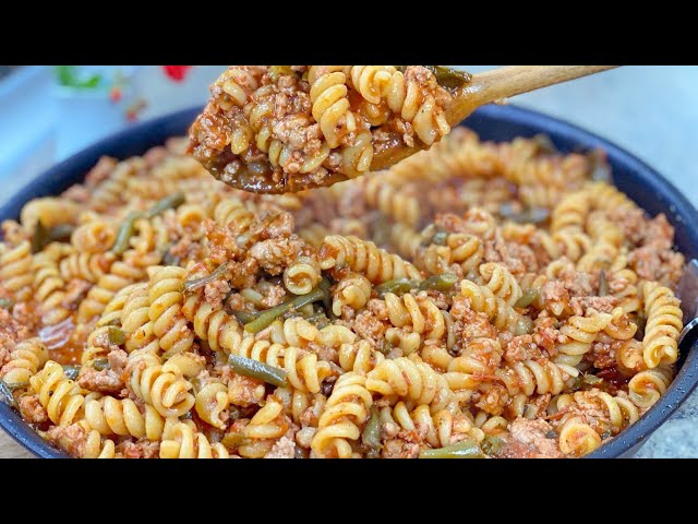 A quick dinner of pasta in a delicious tomato sauce! Delicious pasta with minced meat
