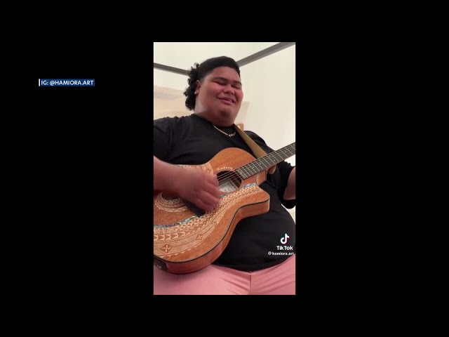 Local artist gifts custom guitar to Iam Tongi honoring his family, heritage