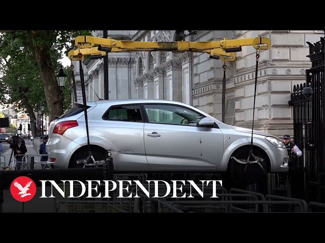 Watch: Police remove car after it crashed into Downing Street gates
